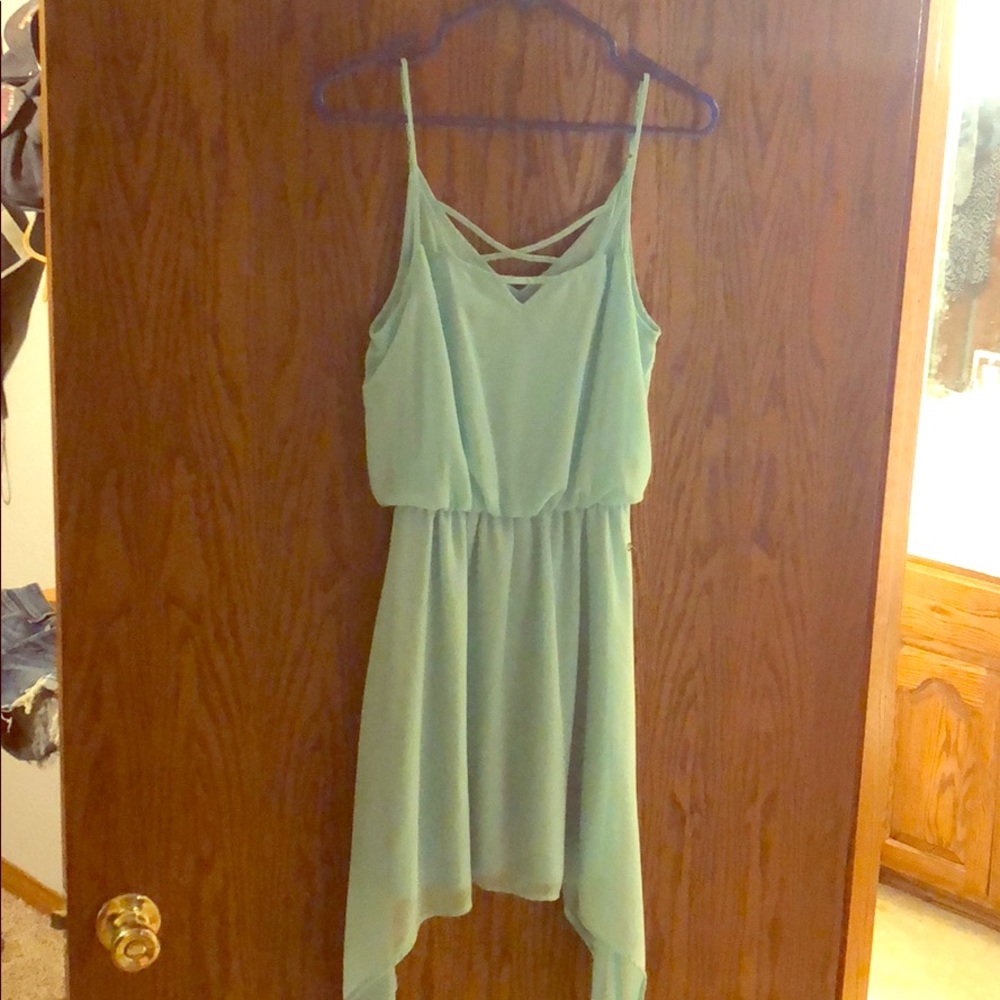 Flowy spaghetti strap dress with lengthy sides